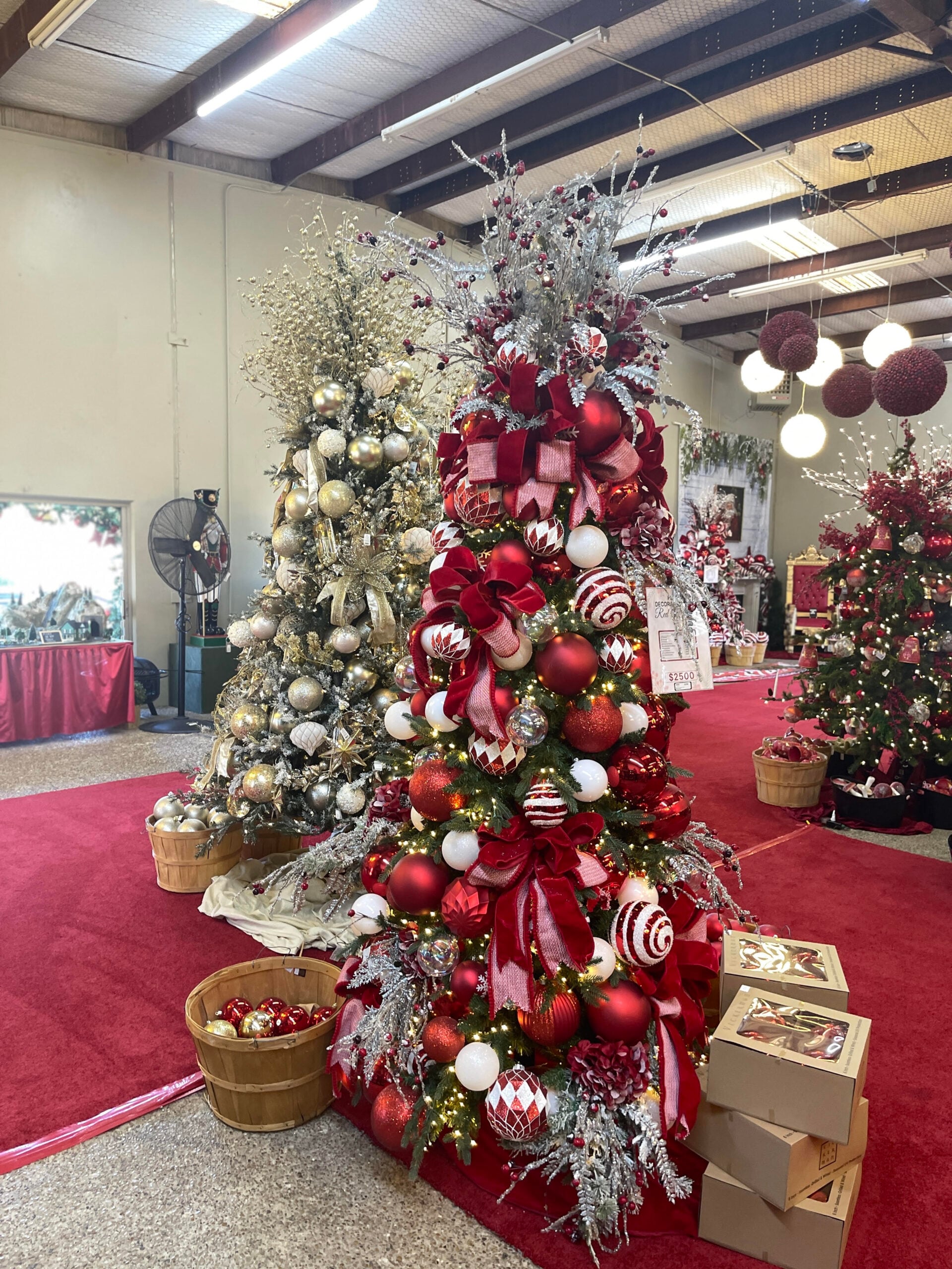 Candy Cane Corner themed Christmas tree with red and white ornaments and velvet bows