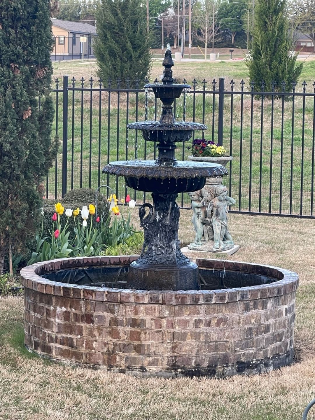 Tiered metal New Orleans style fountain