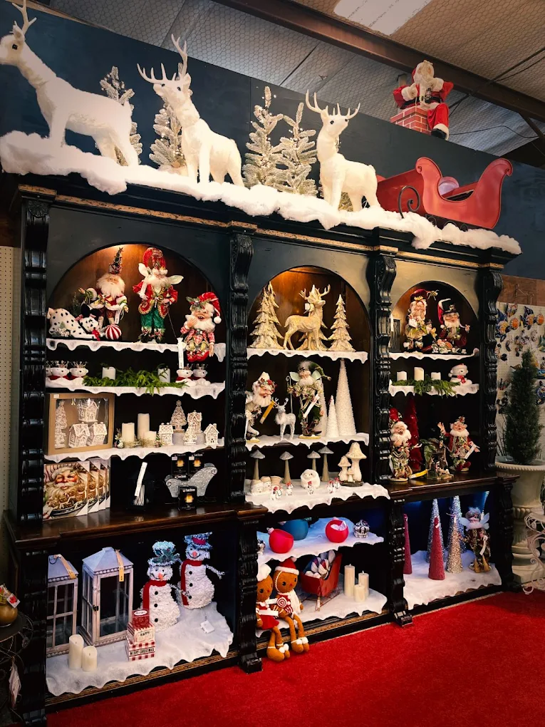 Collectible figurines displayed on shelves at Candy Cane Corner