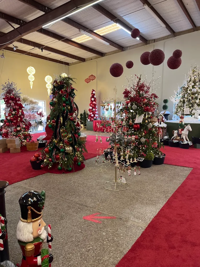Decorated Christmas trees along the red carpet