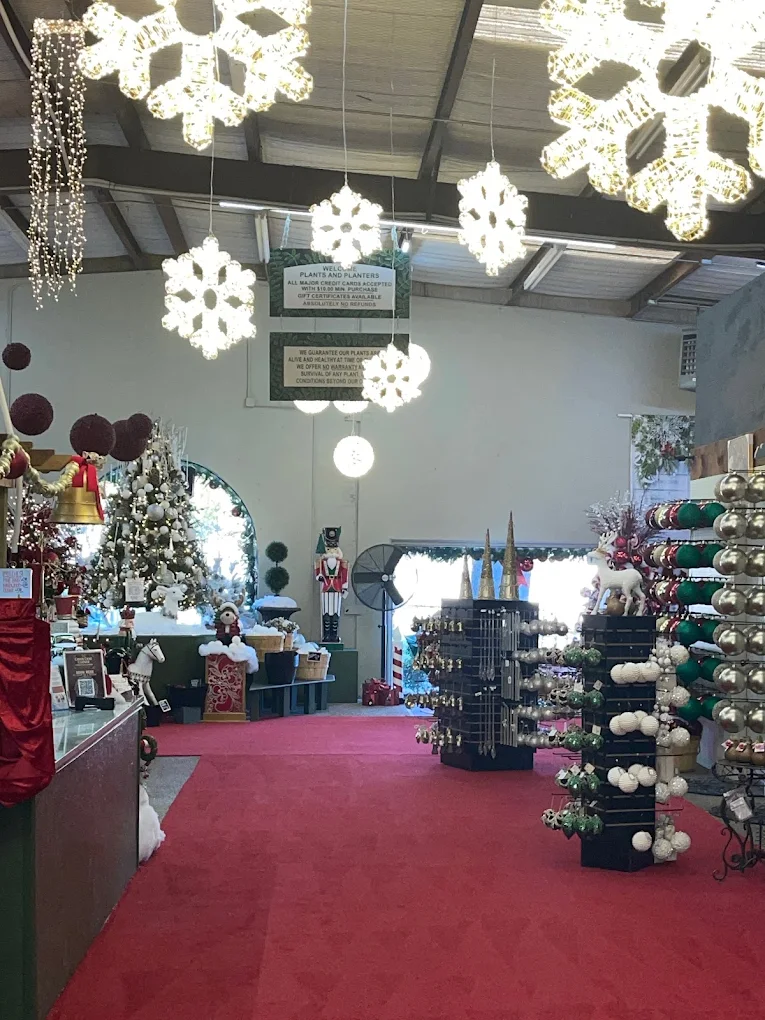 A Candy Cane Corner aisle with hanging snowflakes
