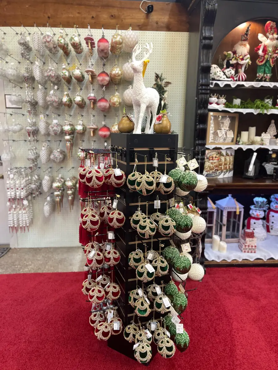 Christmas ornaments in reds, golds and greens on display at Candy Cane Corner